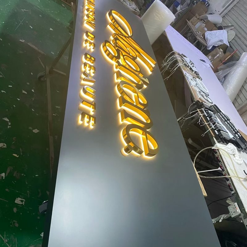 electroplated stainless steel illuminated storefront channel letters mirror gold metallic backlit channel letters