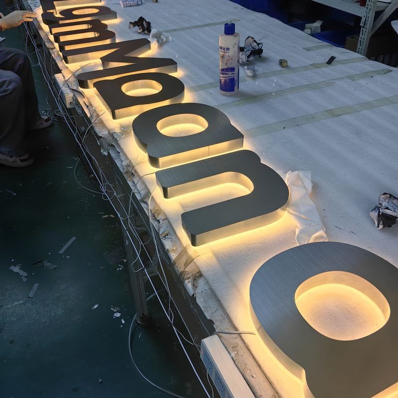 electroplated stainless steel illuminated storefront channel letters mirror gold metallic backlit channel letters