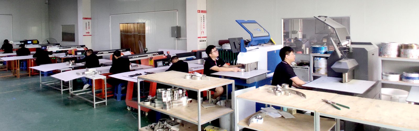 Hicen channel letter forming workshop with workers and production equipment