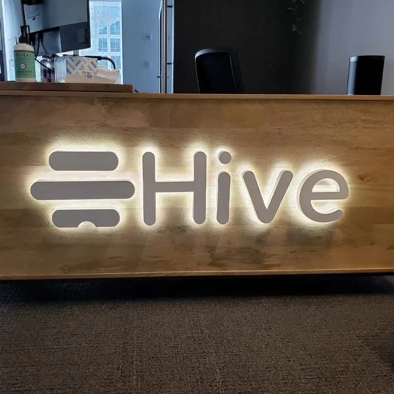 Warm white backlit office logo sign