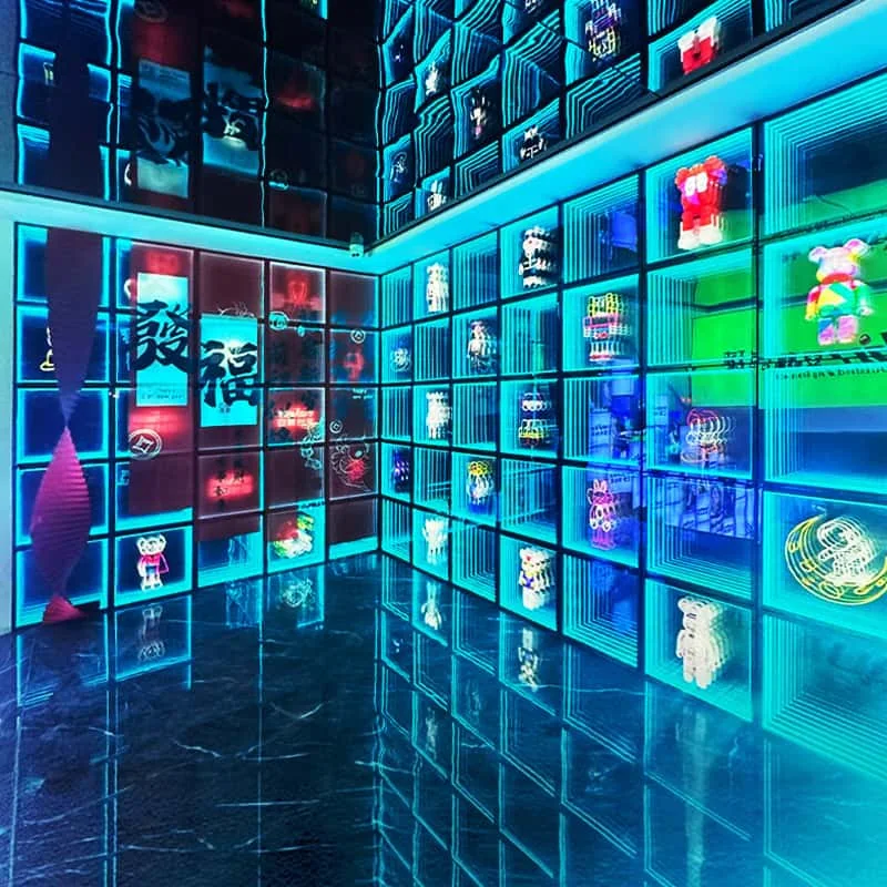 Showroom displaying many illuminated signage products and colors