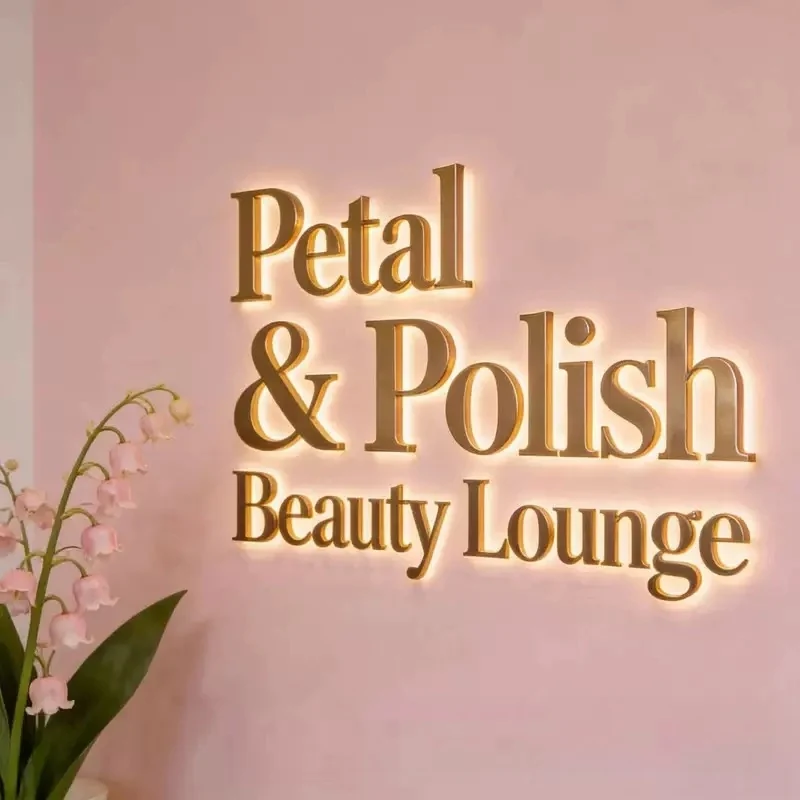 Gold metal beauty lounge letters
