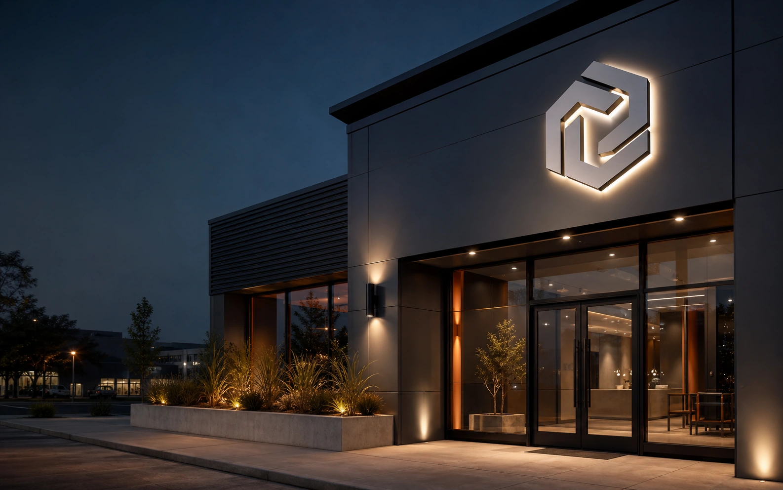 Illuminated exterior dimensional signage on a modern commercial storefront