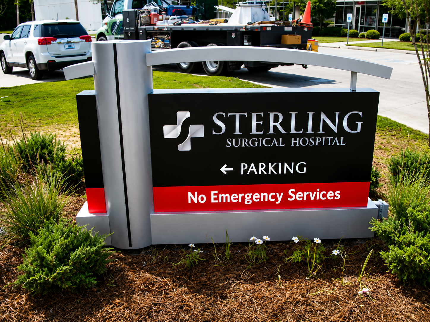 Hospital monument sign in a landscaped commercial property