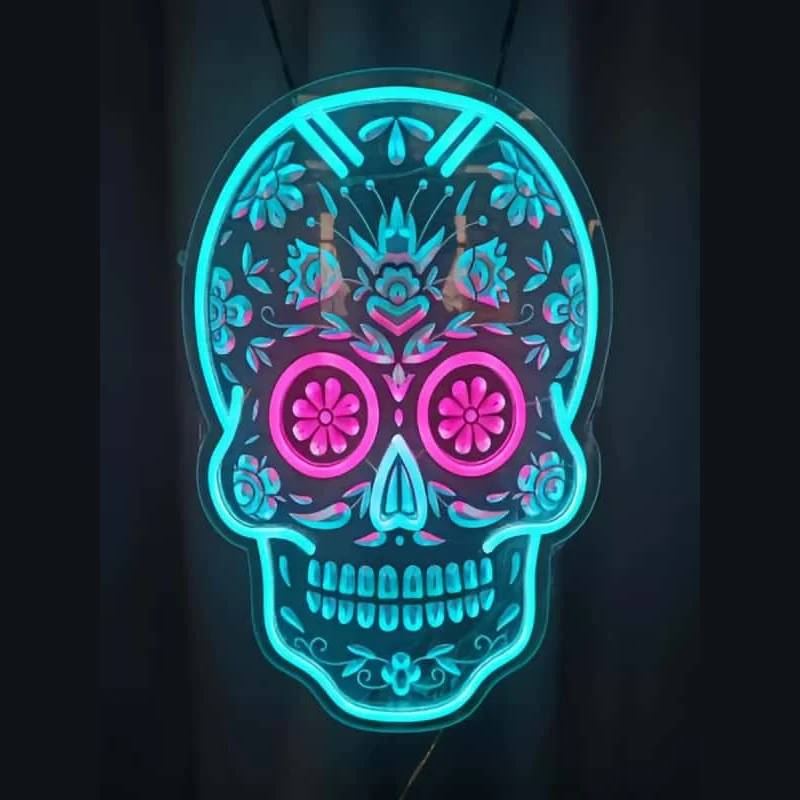 Blue LED neon skull sign on a dark background