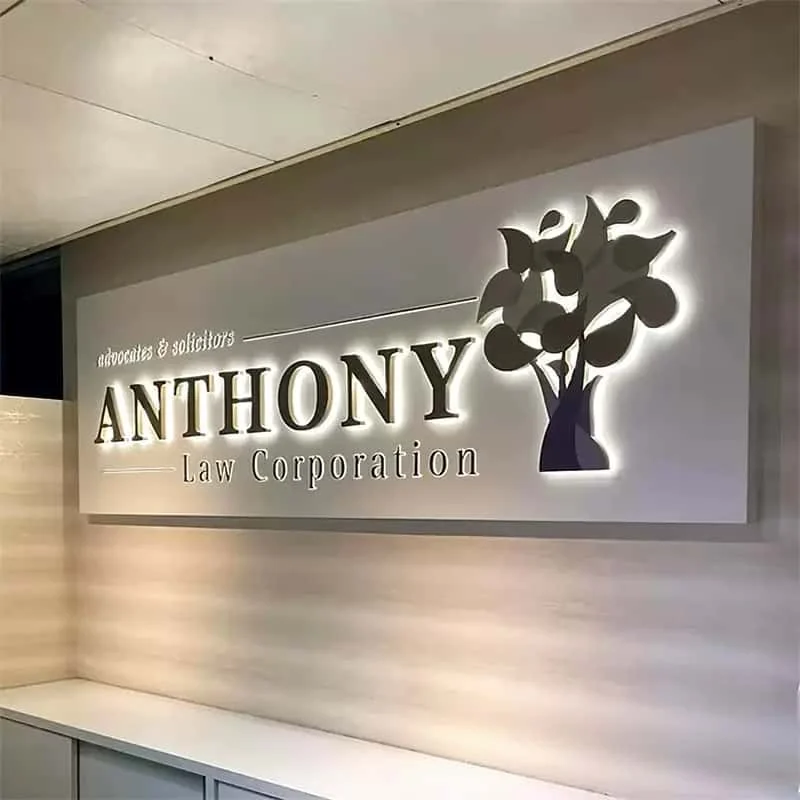 Anthony halo-lit logo on a neutral interior wall