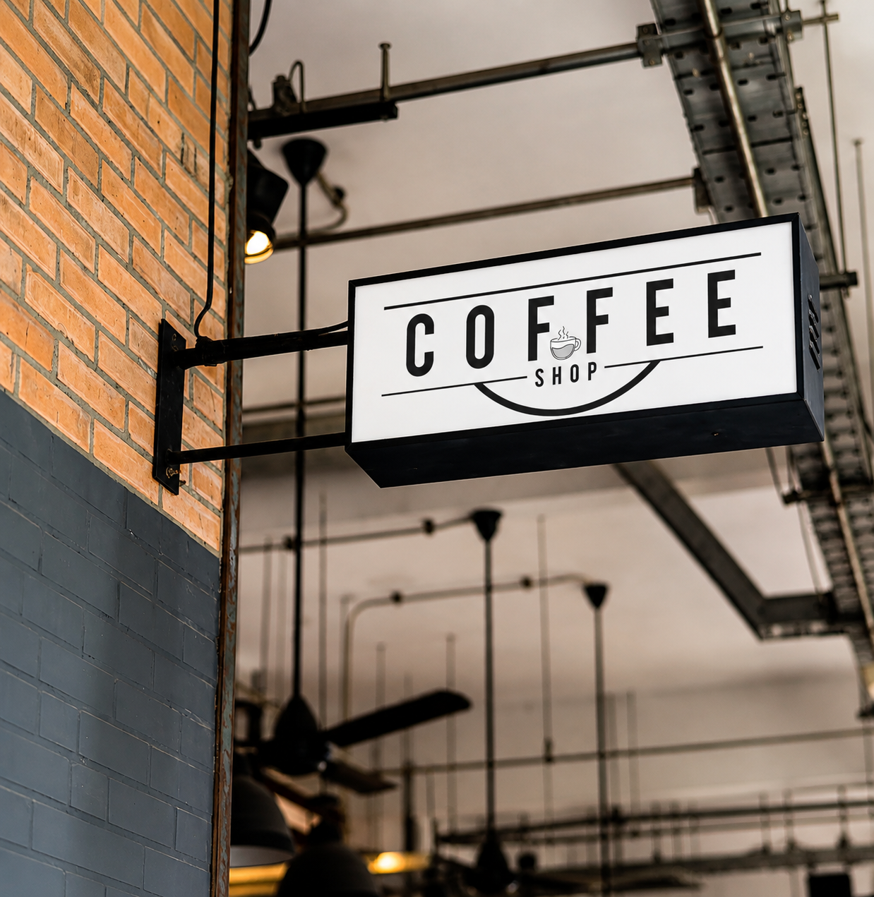 Rectangular illuminated coffee shop sign with wall bracket