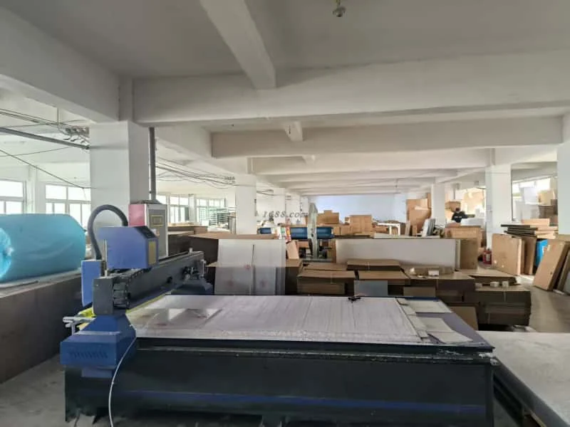 CNC cutting equipment in a signage workshop