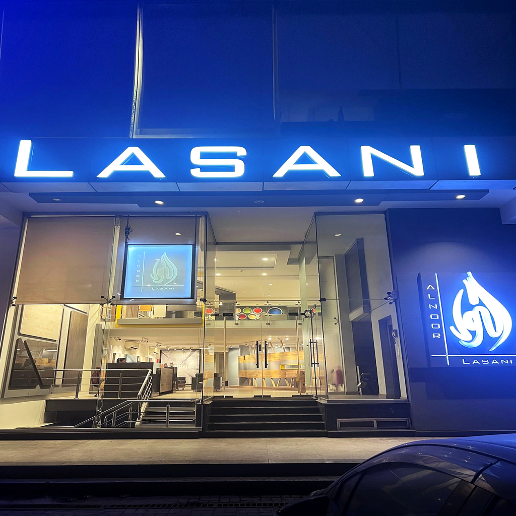 Custom illuminated aluminum storefront letters with multi-color LED display