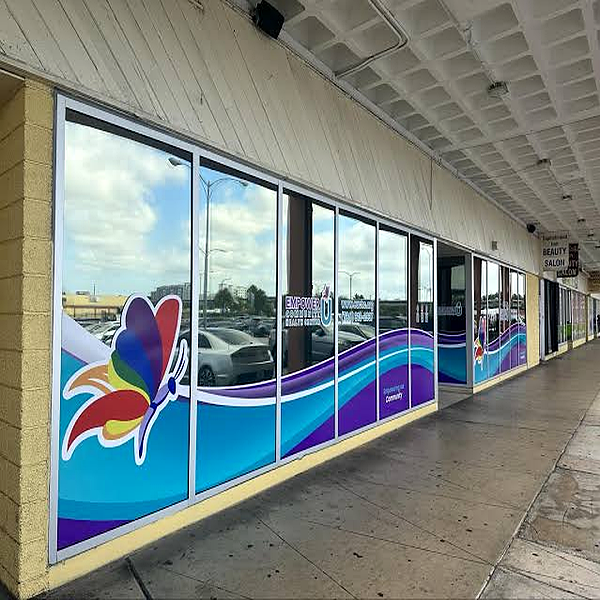 Custom vinyl window graphics and decals on a beauty salon storefront