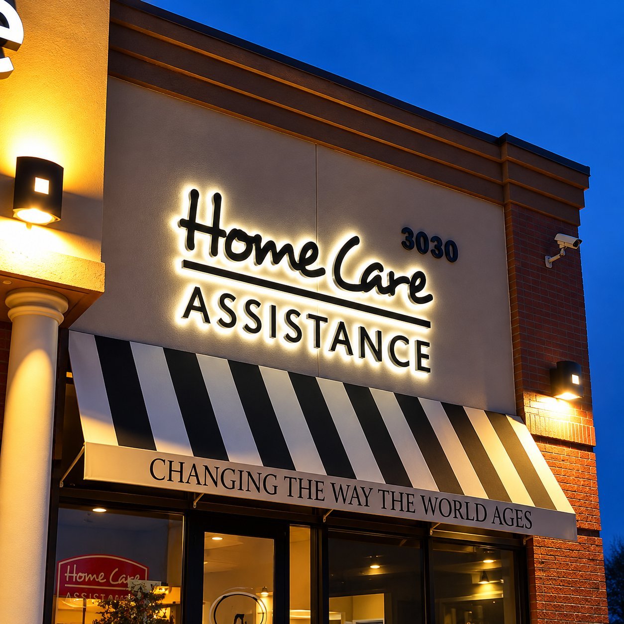 Illuminated channel-letter storefront sign at night