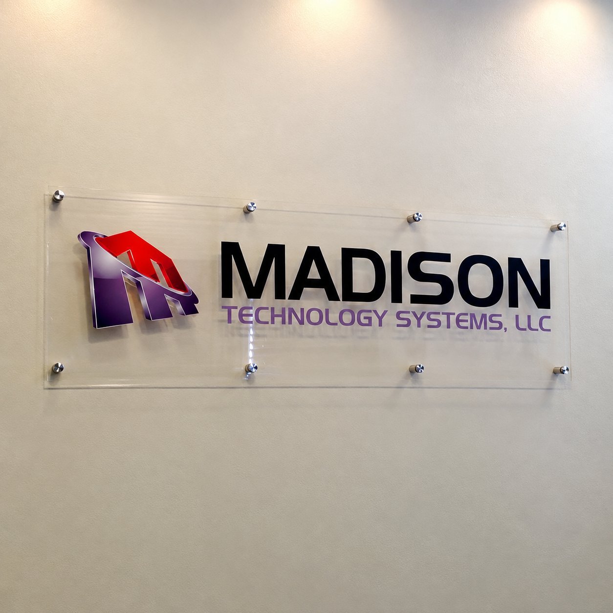 Acrylic lobby sign with standoff mounting