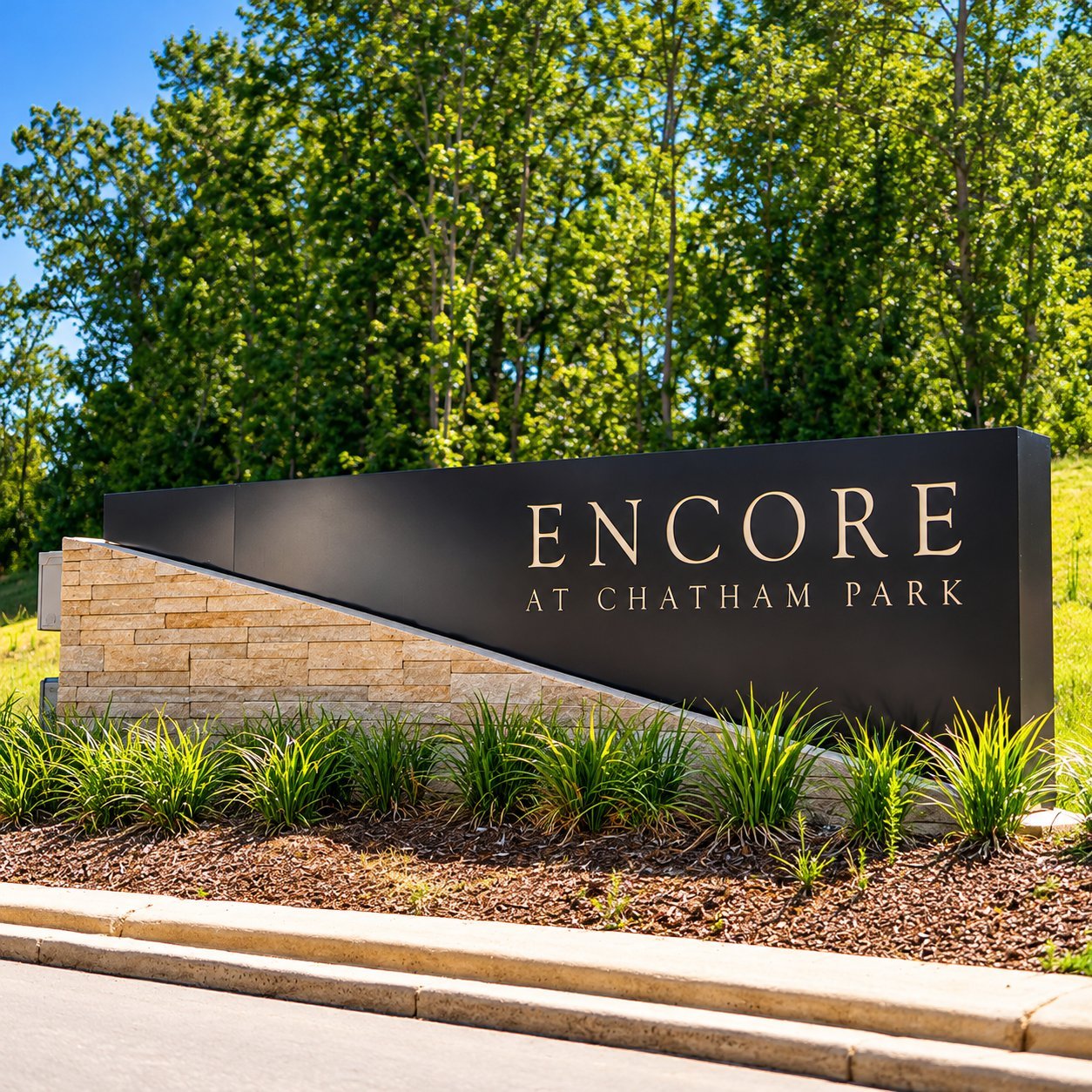 Low-profile monument sign at a property entrance