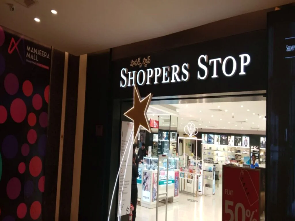 Illuminated 3D white storefront letters