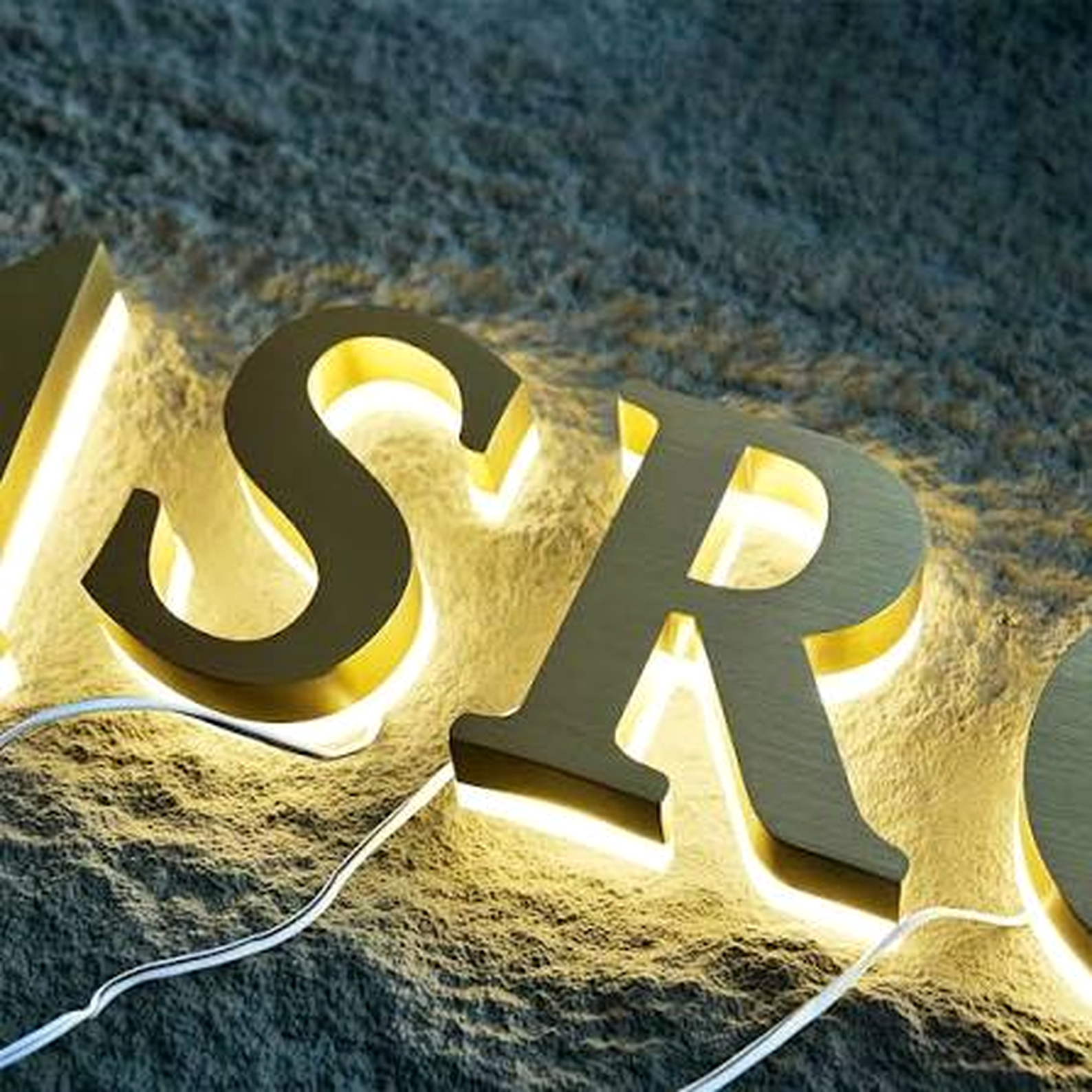Brushed stainless steel 3D sign letters with gold backlight halo, manufactured by HC Signs